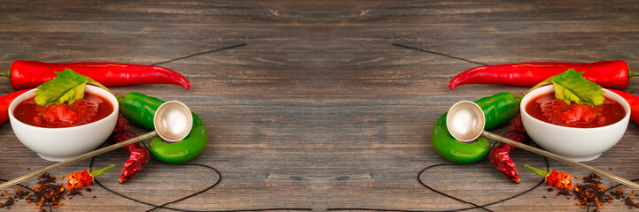 Chili sauce, salsa sauce, dried chili pods, fresh chili pods, wide panoramic