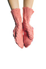 Empty palm of girl in pink mittens on a white background