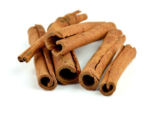 Cinnamon sticks isolated on white background. Close-up. Natural