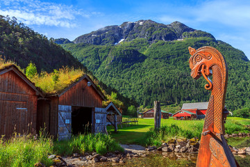 Old viking boats replica in a norwegian landscape - 124912129