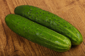 Two green cucumbers