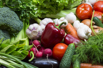 Background of fresh vegetables and greens closeup