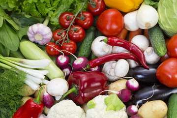 Background of fresh vegetables and greens closeup