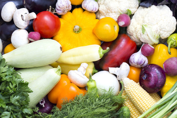 Background of fresh vegetables and greens closeup