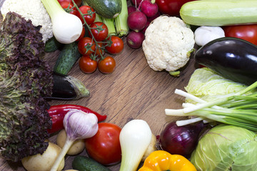 Background of fresh vegetables and greens closeup