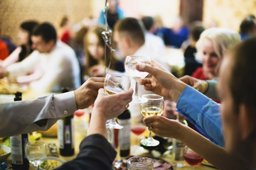 hands with beer glasses with shallow depth of field