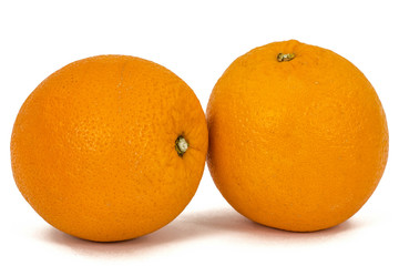 Two orange fruit, isolated on white background