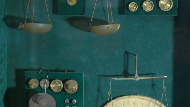 the Old Apothecary Scales. Old Chemist Shop. Small Pan Balance With Weights of Various Sizes