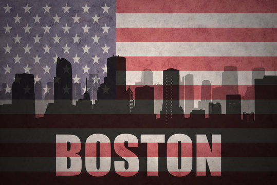 abstract silhouette of the city with text Boston at the vintage american flag