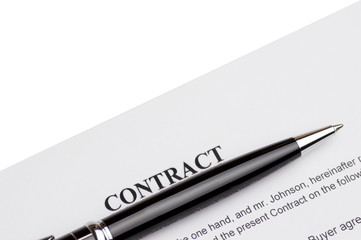 Close-up of pen on contract