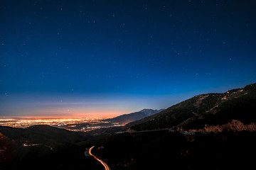night mountain view above city