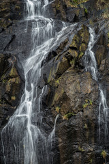 Close-up of flowing water at a waterfall