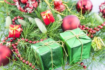 Fototapeta na wymiar Beautiful christmas composition with fir branch and Christmas decoration