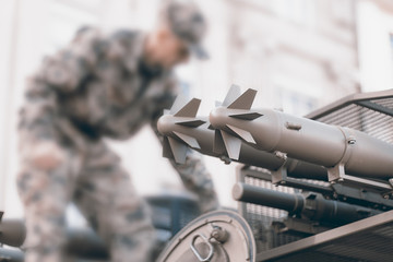 Military tank and soldier, Troops prepare equipment.