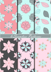 Set of six seamless patterns with flowers in pink, blue and gray colors. Vector background