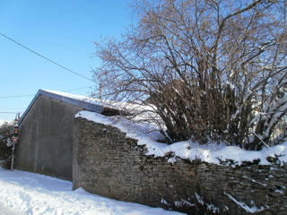An old wall of an house during winter
