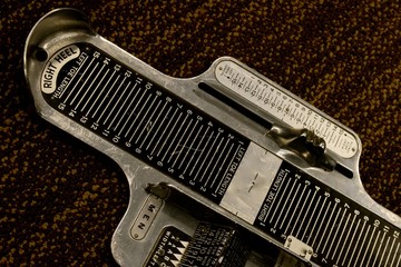 FootMeasure / a Metal tool to measure foot size to determine shoe size.
