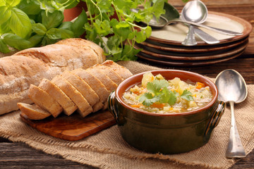 Autumn vegetable soup with toasts and space for text