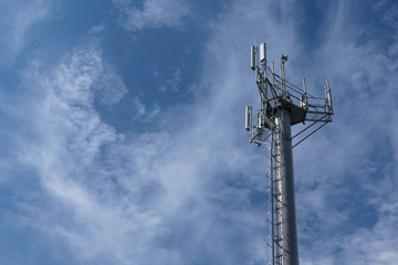 Obraz premium repeater telecommunication tower with blue sky