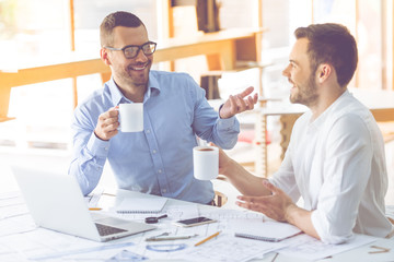 Obraz premium Handsome businessmen co-working