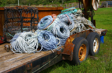 Coils of nautical rope on old rusty trailer  Newport, Oregon Coast