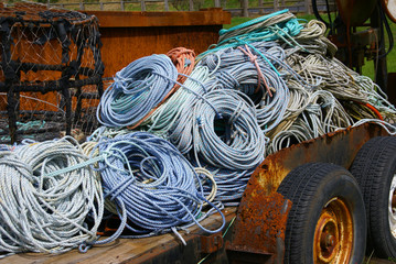 Coils of nautical rope on old rusty trailer  Newport, Oregon Coast