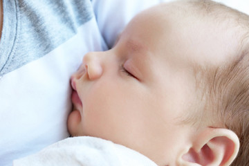 Portrait of cute sleeping baby, close up view