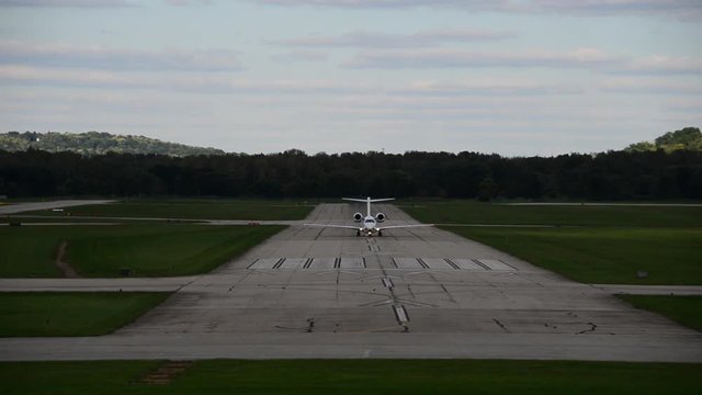 Small airplane on runway, Lunken Airport in Cincinnati, Ohio.