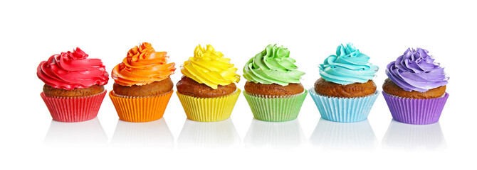 Fresh tasty cupcakes isolated on white