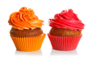 Fresh tasty cupcakes isolated on white