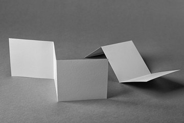 Blank booklets on grey background