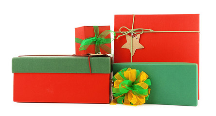 Christmas gifts in colourful boxes isolated on white
