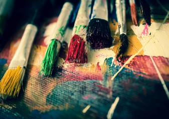 Artist paint brush on painting background