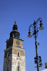 Fototapeta na wymiar clock-tower n lamp-post