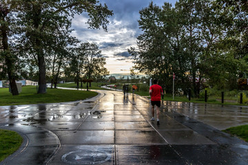 Runners in Calgary after rainfall