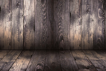Natural Dark Wooden background. Old dirty wood tables or parquet with knots and holes and aged partculars.