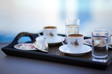 Delicious Turkish coffee in a traditional porcelain cup