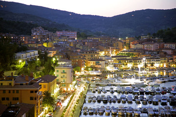 porto-ercole harbor at dusk