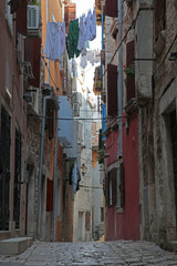 narrow street n hanging laundry