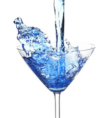 Blue cocktail with splash on white background