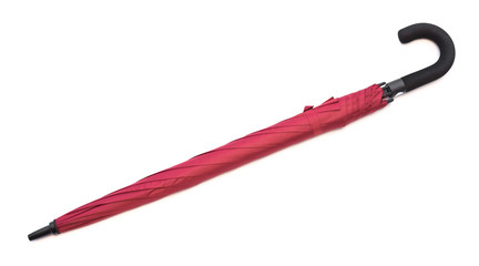 folded red umbrella on a white background