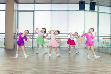 happy children dancing on in hall, healthy life, kid's togethern