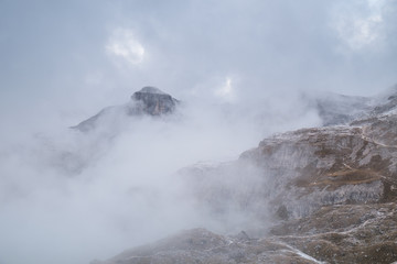 Misty mountain scene in Dolomites mountain