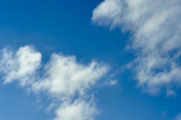 white clouds in the blue sky