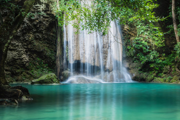 Erawan waterfall, the beautiful waterfall in deep forest at Erawan National Park - A beautiful waterfall on the River Kwai. Kanchanaburi, Thailand