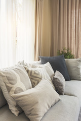Fototapeta na wymiar Pillows on sofa Room interior Home Decoration background Morning