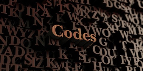 Codes - Wooden 3D rendered letters/message.  Can be used for an online banner ad or a print postcard.