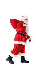 Santa Claus carries a bag with gifts.
