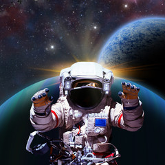 Fototapeta na wymiar Fantasy scene of an Astronaut near an alien planet. Computer art & photo