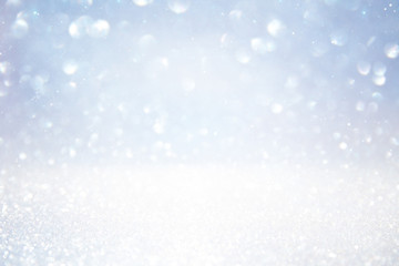 glitter vintage lights background. silver and white
